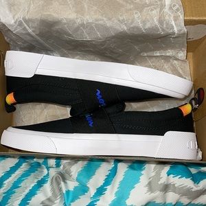 Champion slip on shoes. Never been worn